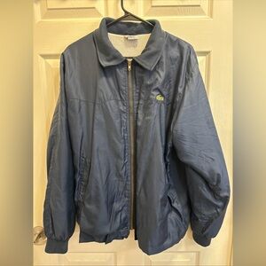 Vintage Lacoste Izod light weight navy blue windbreaker on the blue gator tag